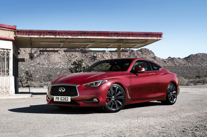 Red 2016 Infiniti Q60 Coupe at Desert Gas Station