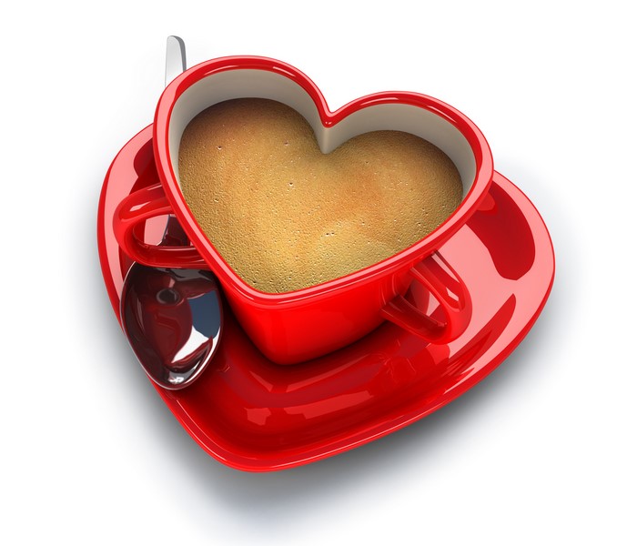 Heart shaped coffee cup with saucer and spoon
