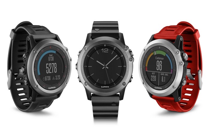 Three Garmin smartwatches with different watch faces