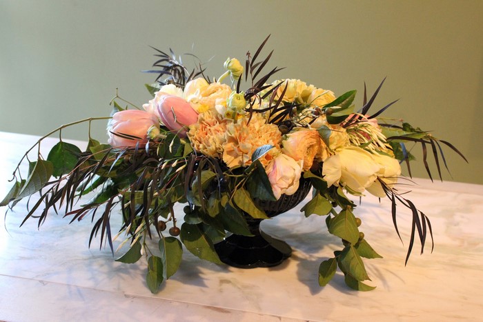 Floral arrangement with tulips and roses