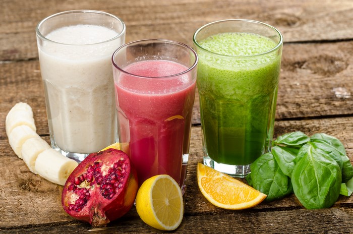 Three glasses of juice with fruits and vegetables