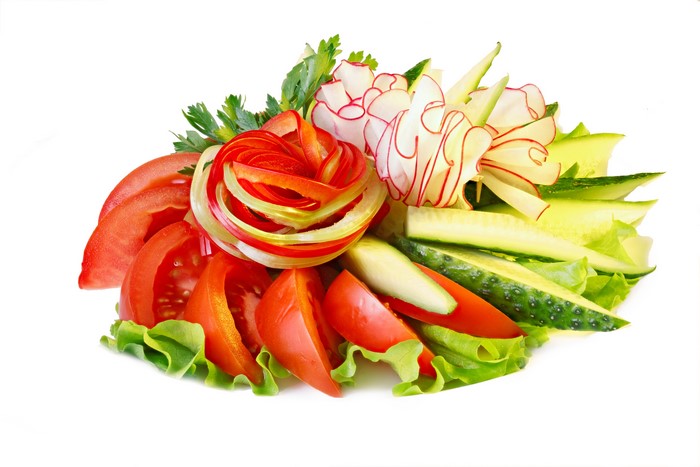 Vegetable platter with tomatoes, cucumbers, and radishes