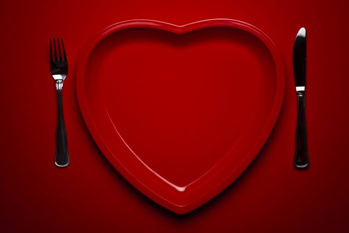 Heart-shaped plate with fork and knife