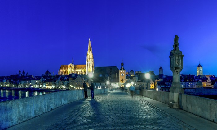 Regensburg Stone Bridge at night with St. Peter's Cathedral