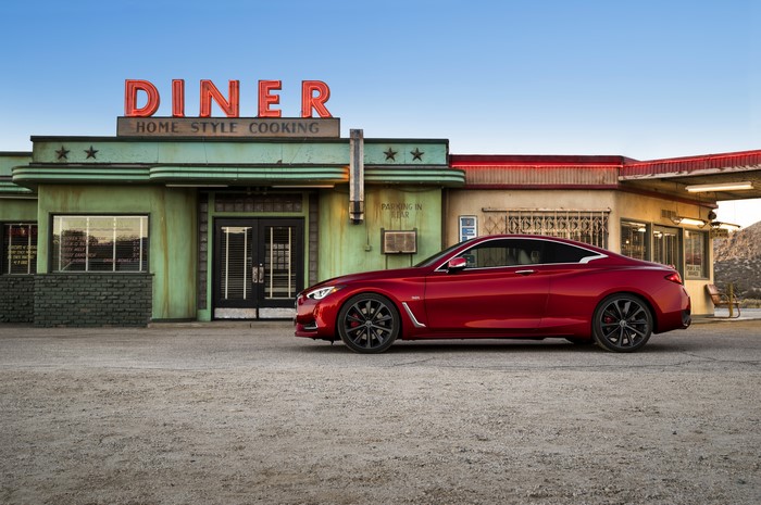 Red 2016 Infiniti Q60 Coupe parked at a retro diner