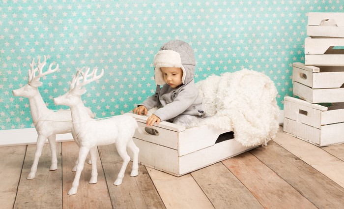 Boy in Winter Hat with Deer Decorations