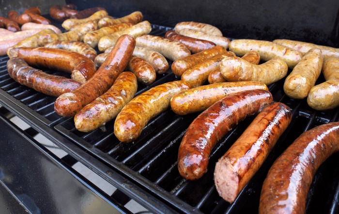 Sausages grilling on a barbecue
