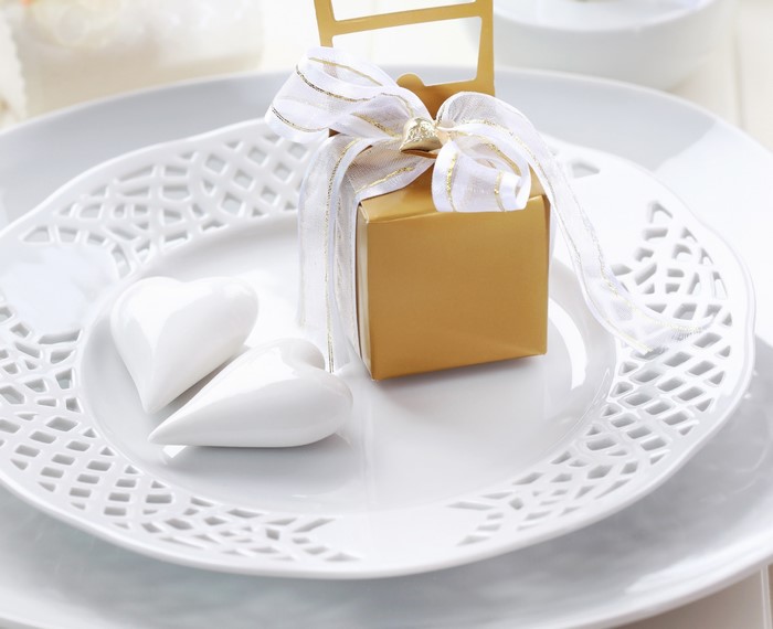 Gold Gift Box with Ribbon and Hearts on Plates