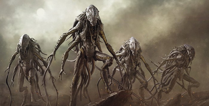 Four alien creatures in a desolate landscape