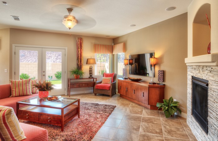 Living room with fireplace and armchair