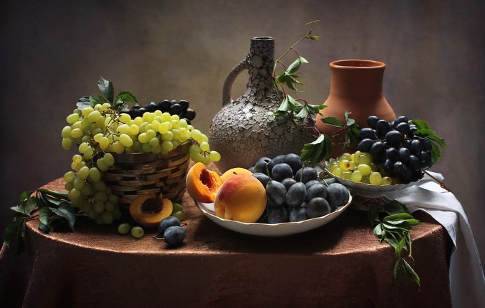 Still life with grapes, peaches, plums, and jugs