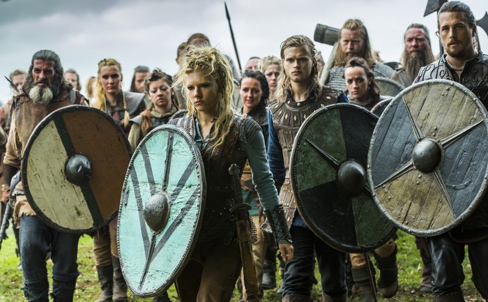 Lagertha and Vikings warriors with shields