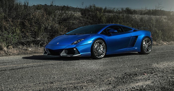 Blue Lamborghini Gallardo on a Road