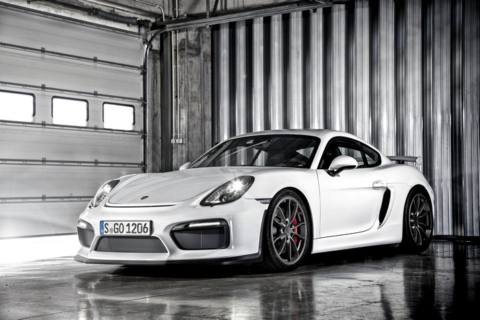 White 2015 Porsche Cayman GT4 in garage