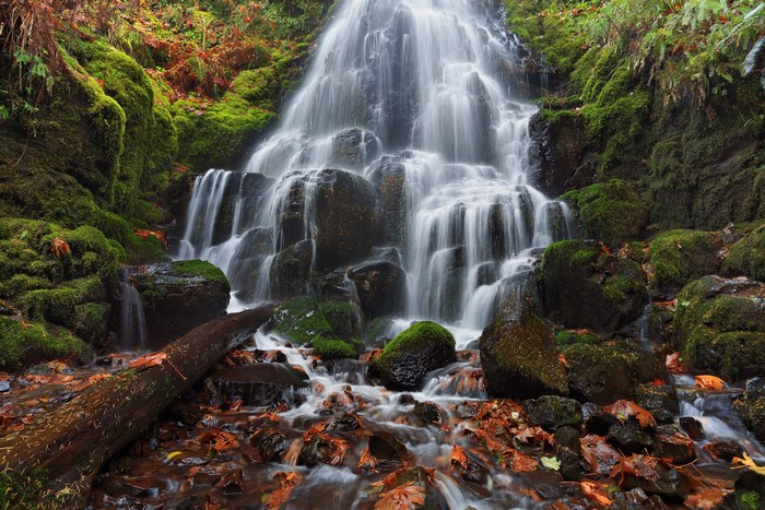 Waterfall cascading over mossy rocks in the Columbia River Gorge, Oregon