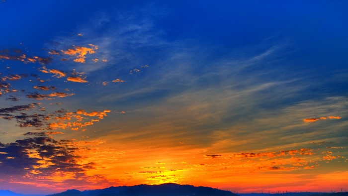 Dramatic Sunset Sky Over Mountains