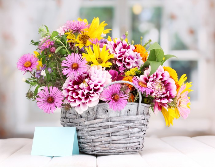 Bouquet of Asters and Dahlias in Wicker Basket