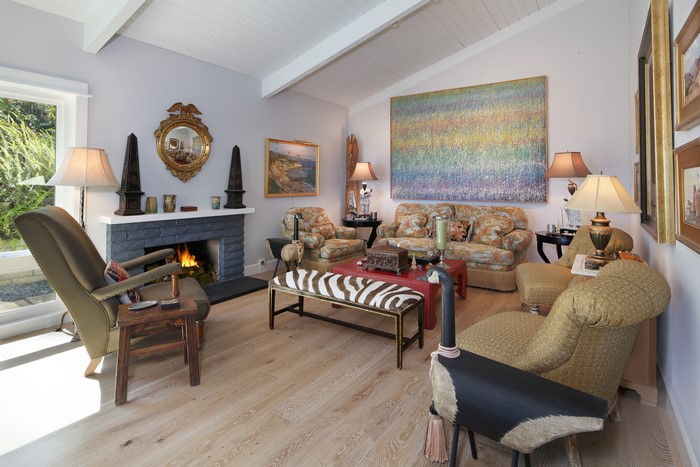 Living room with fireplace and eclectic decor