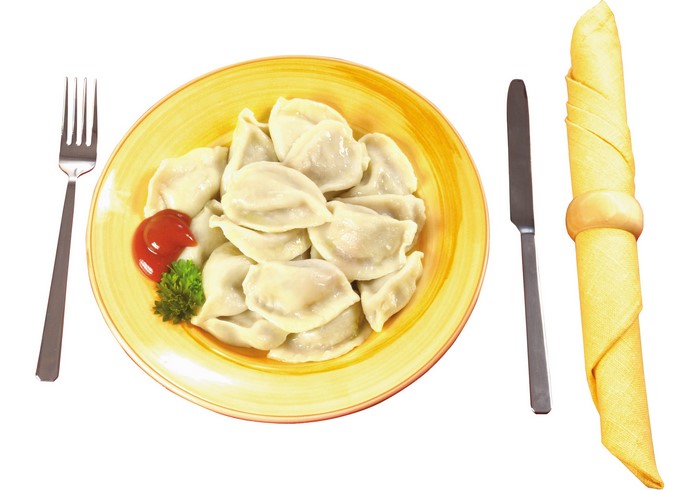 Plate of Pierogi with Ketchup, Fork, Knife, and Napkin