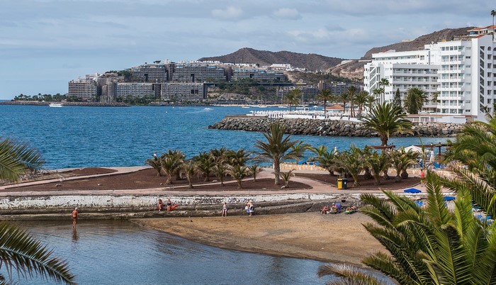 Arguineguin, Spain Coastline with Hotels and Palm Trees