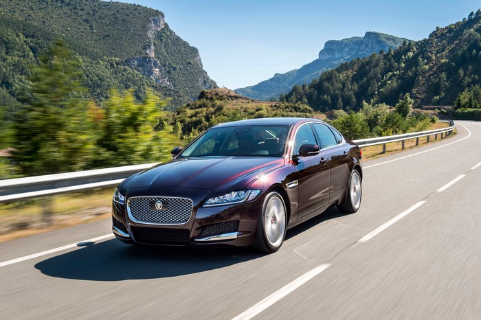 Jaguar XF Prestige driving on a mountain road