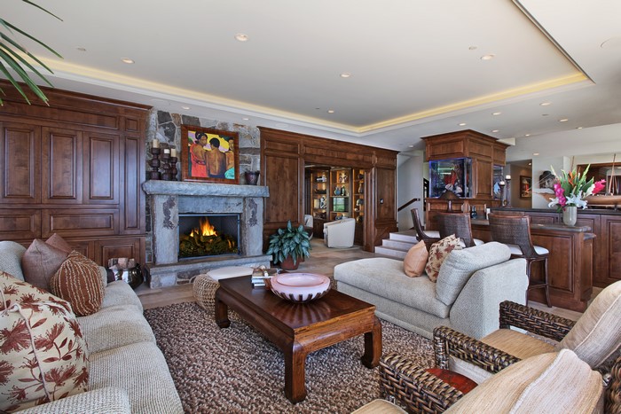Living room with fireplace and bar