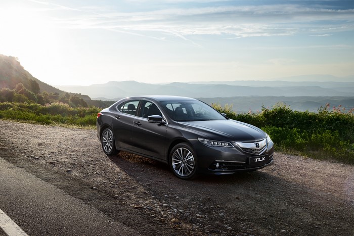 Grey 2014 Acura TLX CIS-spec on a dirt road
