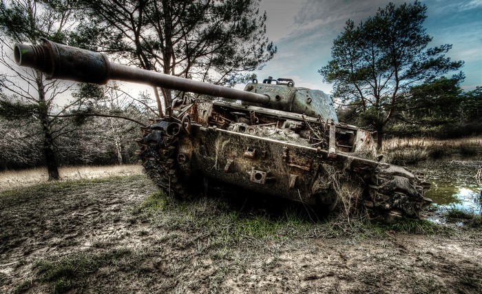 Abandoned tank in a forest