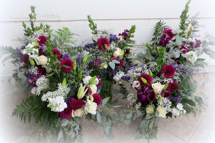 Floral bouquets with dahlias, tulips, and calla lilies