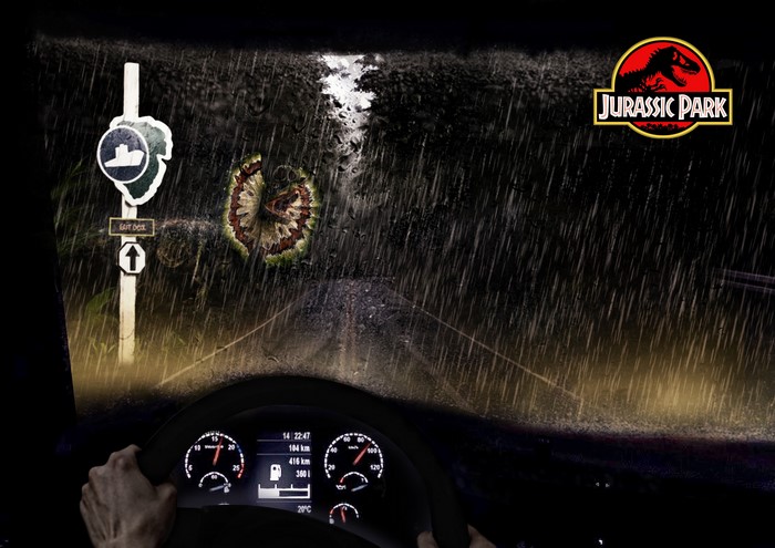 Jurassic Park logo on a rainy night