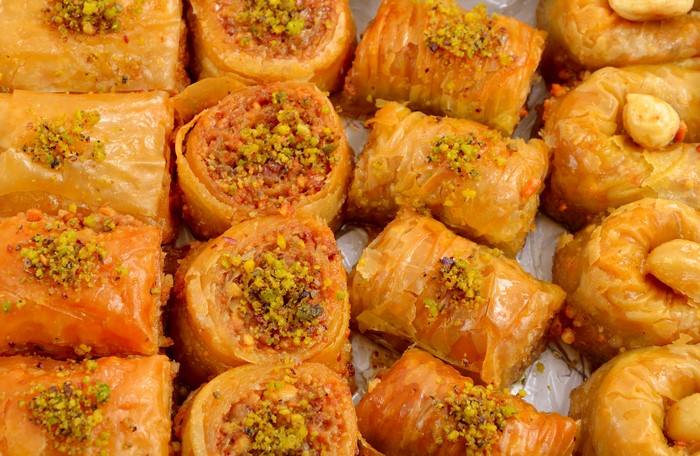 Assortment of Turkish baklava pastries with pistachios
