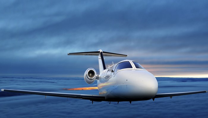 4K Airplane flying over clouds