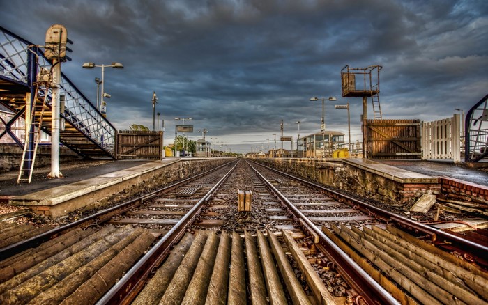 Train station with railroad tracks and platforms