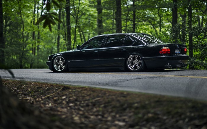 Black BMW 740iL e38 Stance on a Forest Road