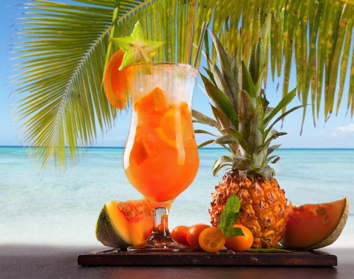 Tropical Cocktail with Fruits and Palm Tree