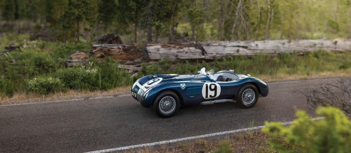 1951 Jaguar C-Type race car on a road