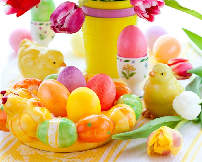Easter Chicks and Colorful Eggs with Tulips