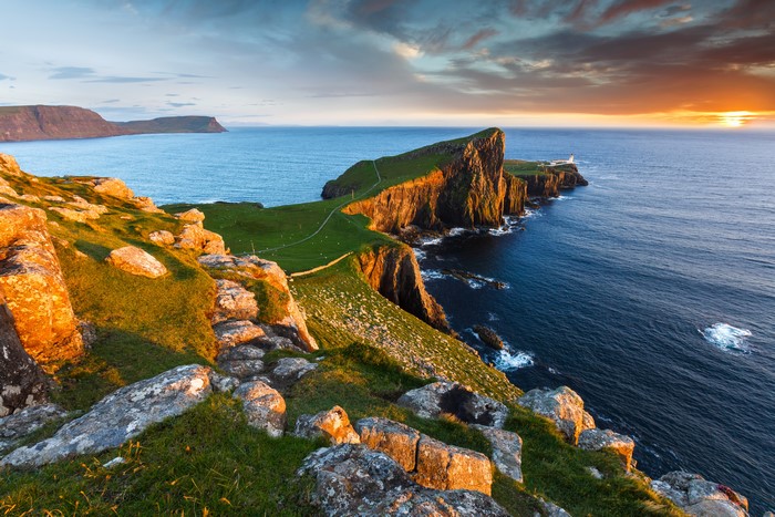 Neist Point Lighthouse, Scotland Coast at Sunset
