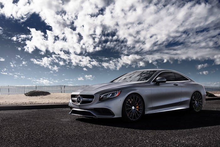 Mercedes-Benz S63 AMG Coupe on a beach road