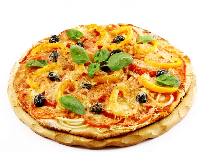 Pizza with tomatoes, bell peppers, olives, and basil