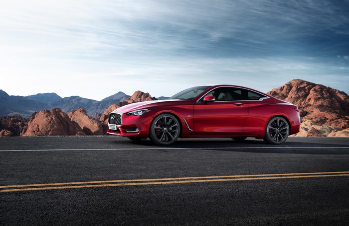 Red 2016 Infiniti Q60 Coupe on a Road