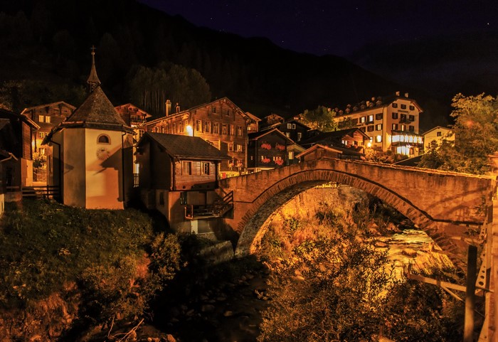 Binn, Switzerland at Night with Bridge and Houses