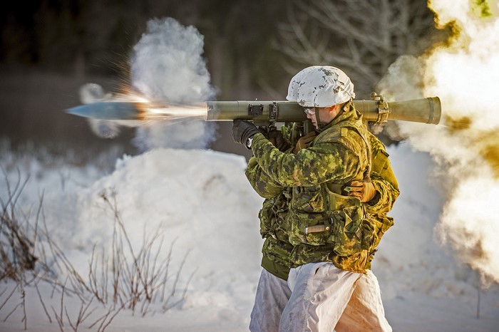 Soldier firing 84mm grenade launcher during Exercise RAFALE BLANCHE