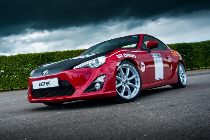 Red Toyota GT86 with #GT86 plate