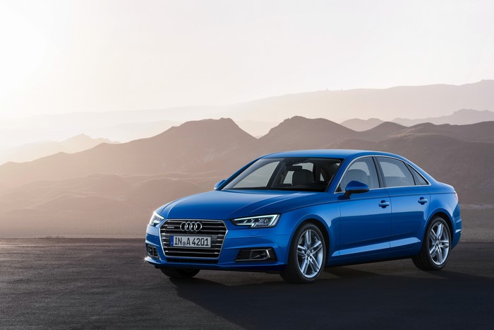 Blue Audi A4 Sedan on Mountain Landscape
