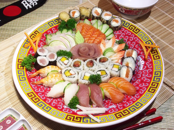 Sushi platter with salmon, tuna, shrimp, and crab