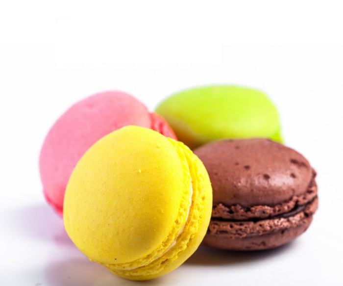 Four colorful macarons