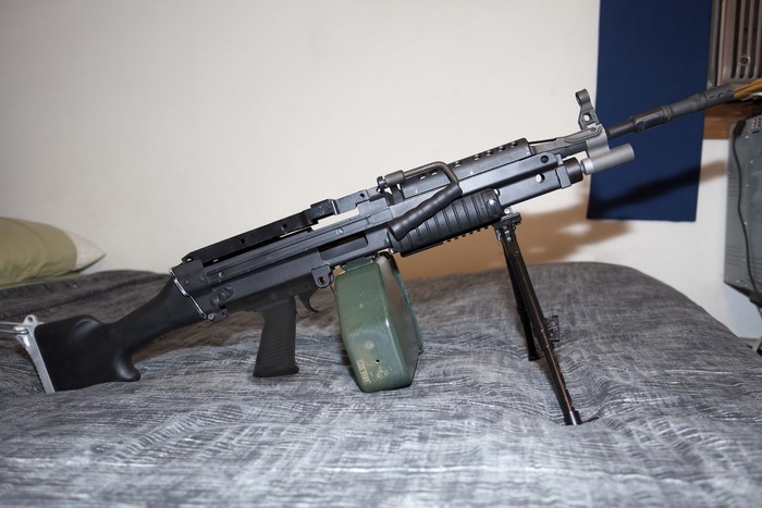 MK46 machine gun with bipod and ammo drum