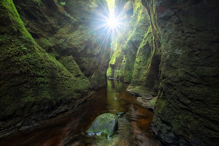 Sunlight Rays in Mossy Finnich Gorge, Scotland