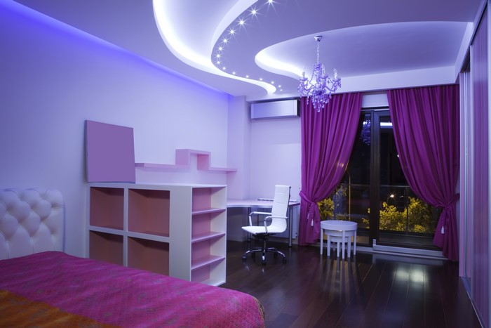 Modern Bedroom with Purple Accents and Chandelier